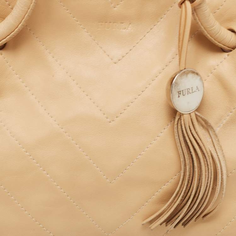 Pre Owned Furla Beige Leather Drawstring Metal Handle Shoulder Bag
