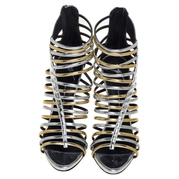 Pre Owned Giuseppe Zanotti Silver/Gold Leather Coline Gladiator Sandals Size 39