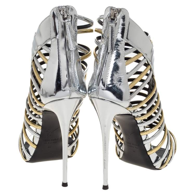 Pre Owned Giuseppe Zanotti Silver/Gold Leather Coline Gladiator Sandals Size 39