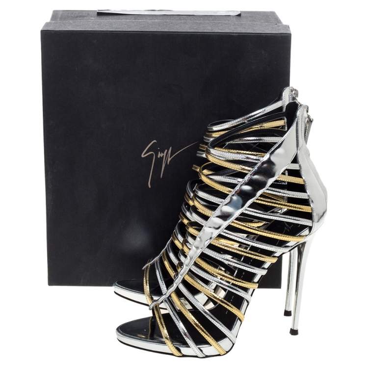 Pre Owned Giuseppe Zanotti Silver/Gold Leather Coline Gladiator Sandals Size 39