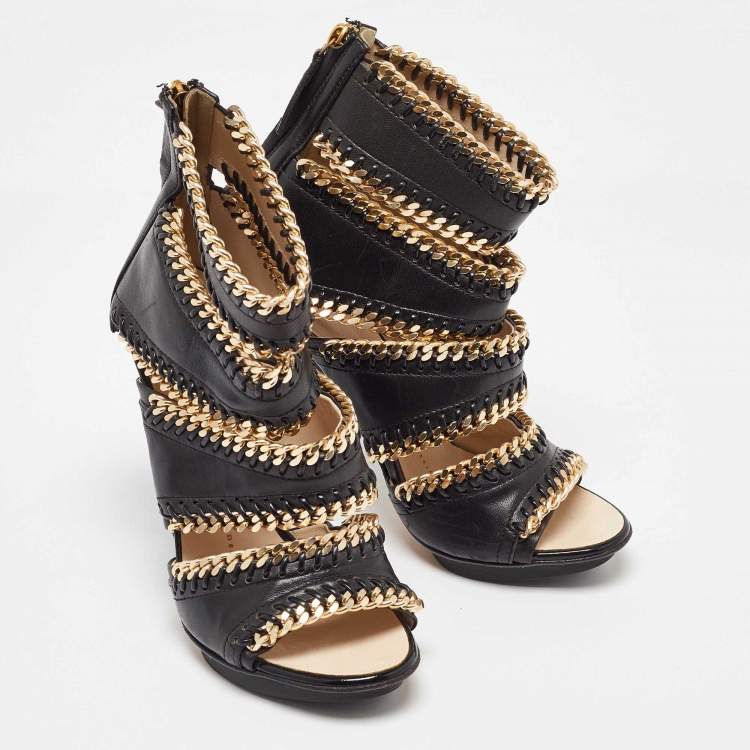 Pre Owned Giuseppe Zanotti Black Leather Chain Embellished Trim Cut Out Sandals Size 35.5