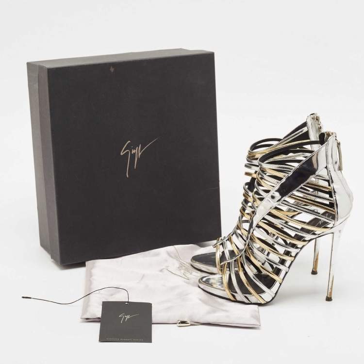 Pre Owned Giuseppe Zanotti Silver/Gold Leather Coline Gladiator Sandals Size 39
