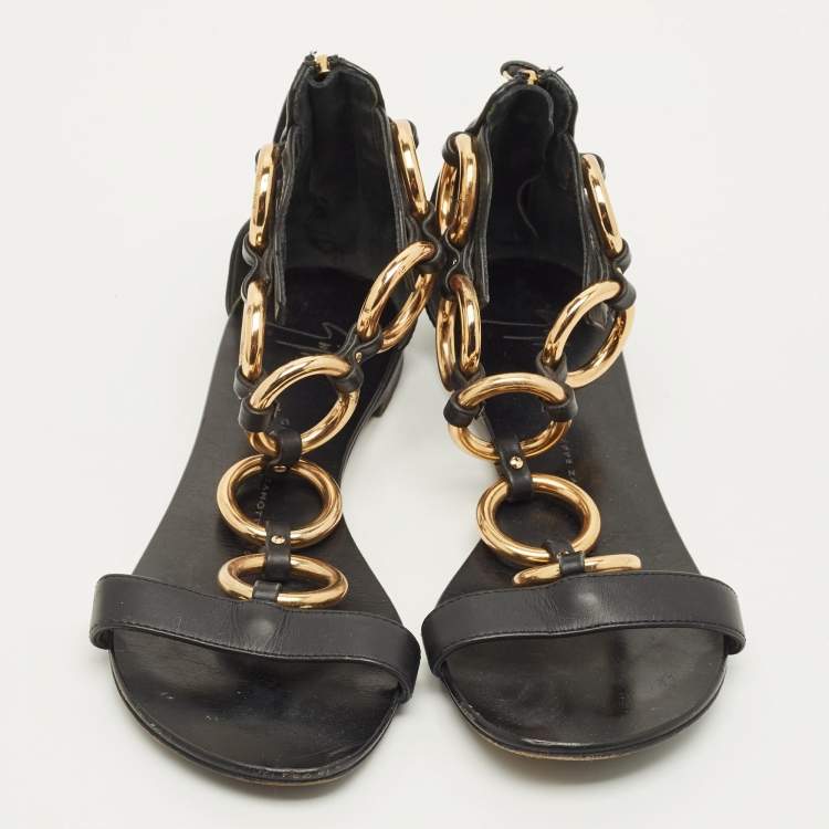 مملوكة مسبقًا Giuseppe Zanotti Size 36 Black Leather and Metal T Strap Flat Sandals