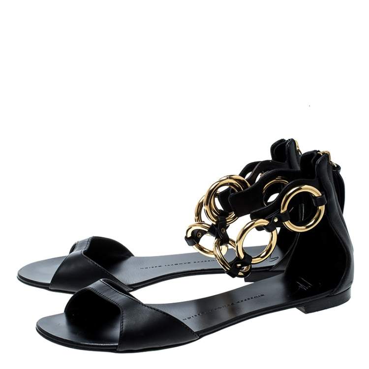 Pre Owned Giuseppe Zanotti Black Leather Gold Ring Open Toe Flat Sandals Size 38