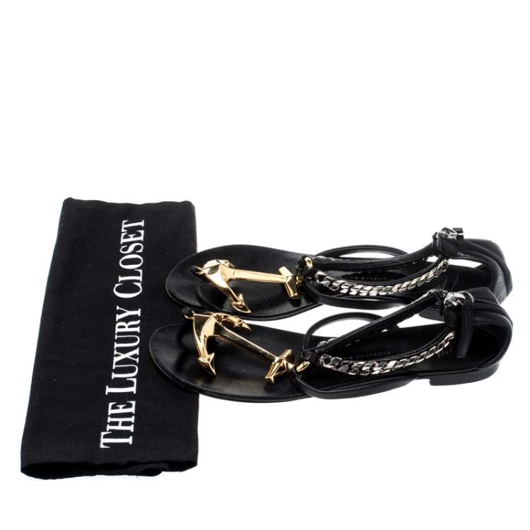 Pre Owned Giuseppe Zanotti Black Leather Gold Anchor Strap Flat Sandals Size 37