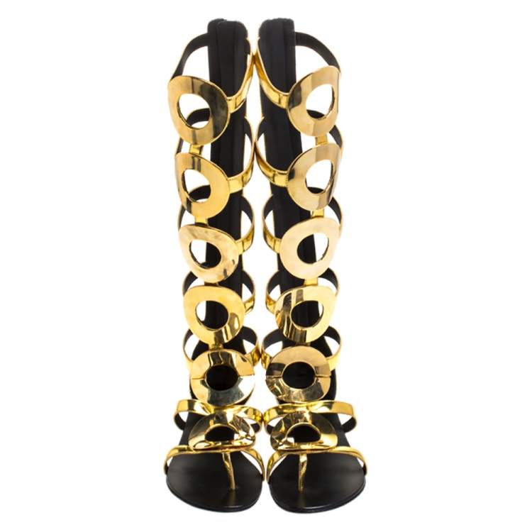 Pre Owned Giuseppe Zanotti Metallic Gold Leather Embellished Rylee Gladiator Flat Sandals Size 41