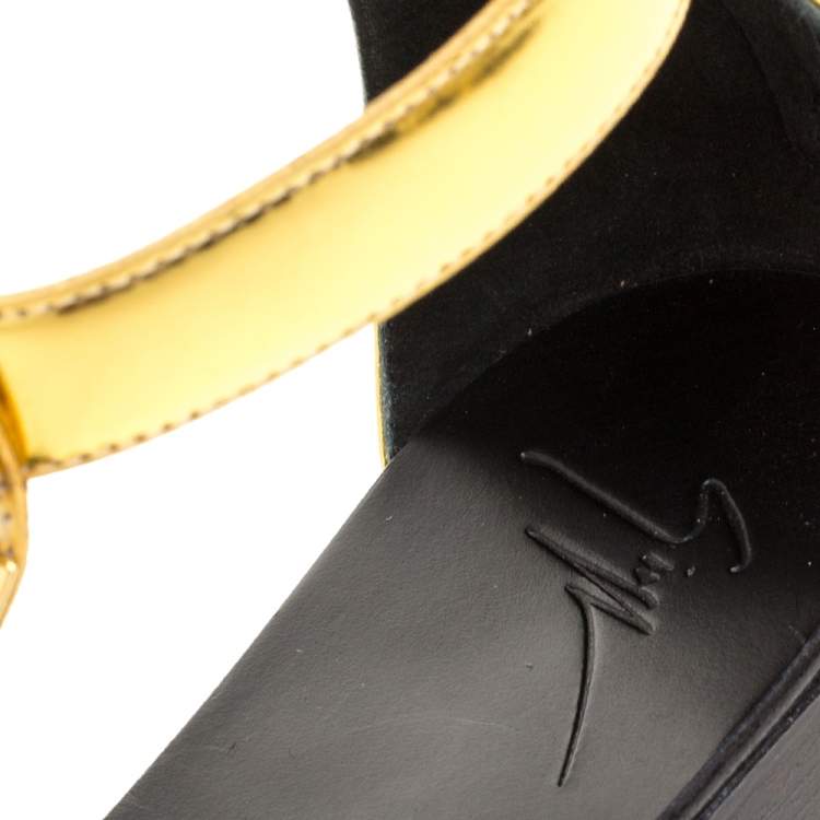Pre Owned Giuseppe Zanotti Metallic Gold Leather Embellished Rylee Gladiator Flat Sandals Size 41