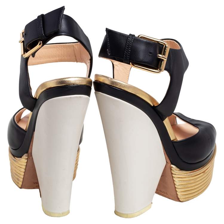 Pre Owned Giuseppe Zanotti Gold/Black Leather Peep Toe Platform Sandals Size 36.5