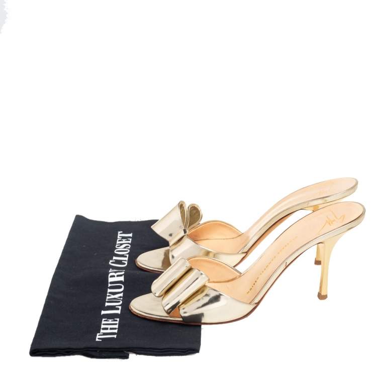 Pre Owned Giuseppe Zanotti Metallic Gold Leather Bow Mule Sandals Size 38.5
