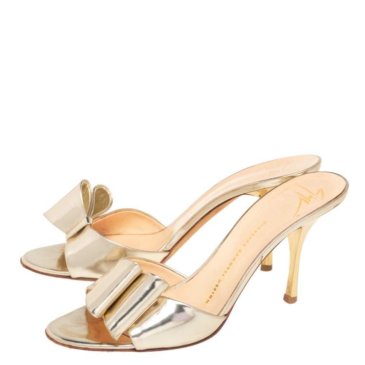 Pre Owned Giuseppe Zanotti Metallic Gold Leather Bow Mule Sandals Size 38.5