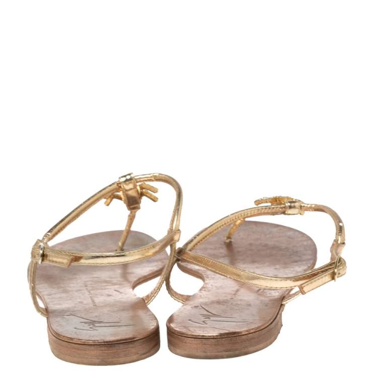 Pre Owned Giuseppe Zanotti Metallic Gold Leather Thong Flat Sandals Size 39