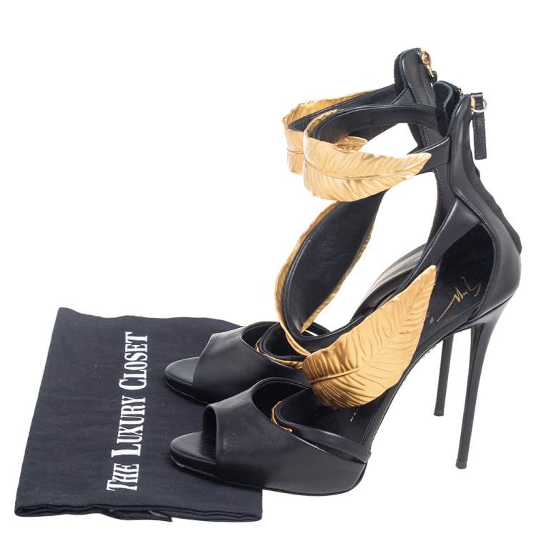 Pre Owned Giuseppe Zanotti Black Leather Gold-Toned Metal Embellished Leaf Ankle-Strap Sandals Size 40