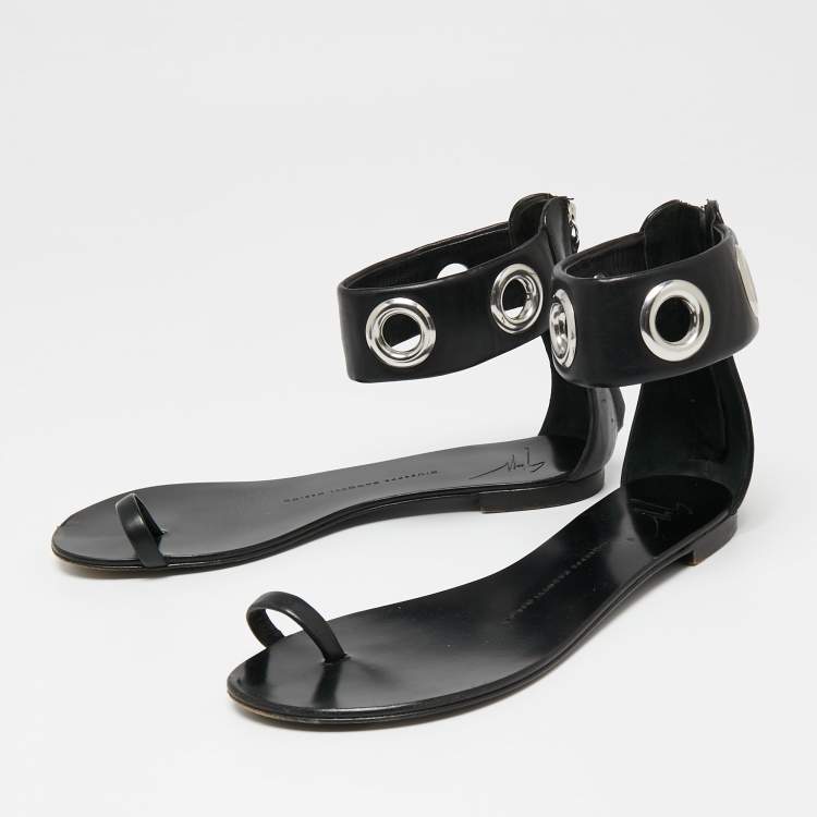 مملوكة مسبقًا Giuseppe Zanotti Black Leather Eyelet Ankle Cuff Flat Sandals Size 38
