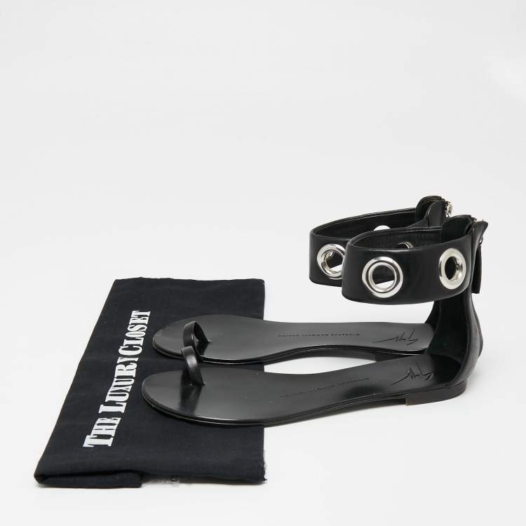 مملوكة مسبقًا Giuseppe Zanotti Black Leather Eyelet Ankle Cuff Flat Sandals Size 38
