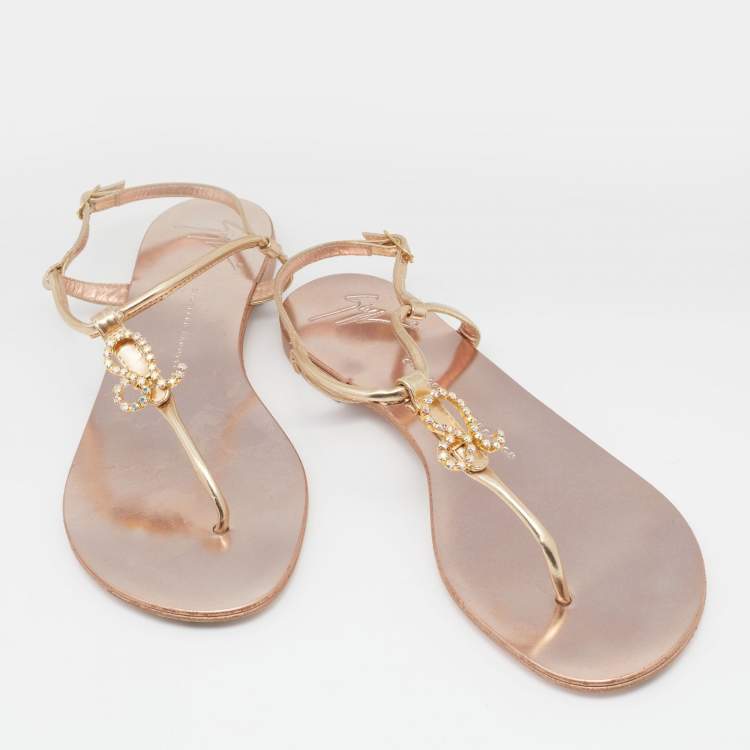 Pre Owned Giuseppe Zanotti Metallic Gold Leather Leo Zodiac Embellished Thong Flat Sandals Size 39