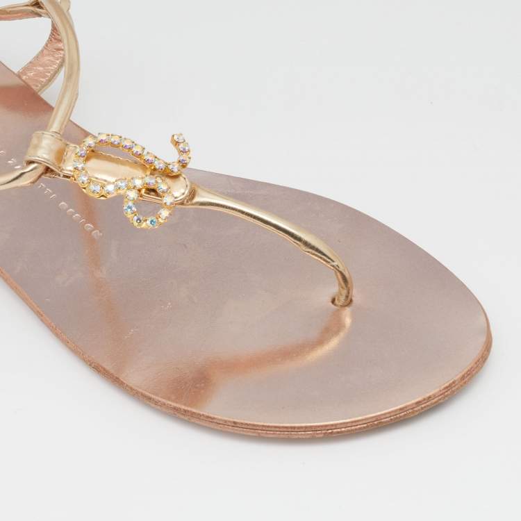 Pre Owned Giuseppe Zanotti Metallic Gold Leather Leo Zodiac Embellished Thong Flat Sandals Size 39