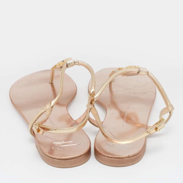 Pre Owned Giuseppe Zanotti Metallic Gold Leather Leo Zodiac Embellished Thong Flat Sandals Size 39