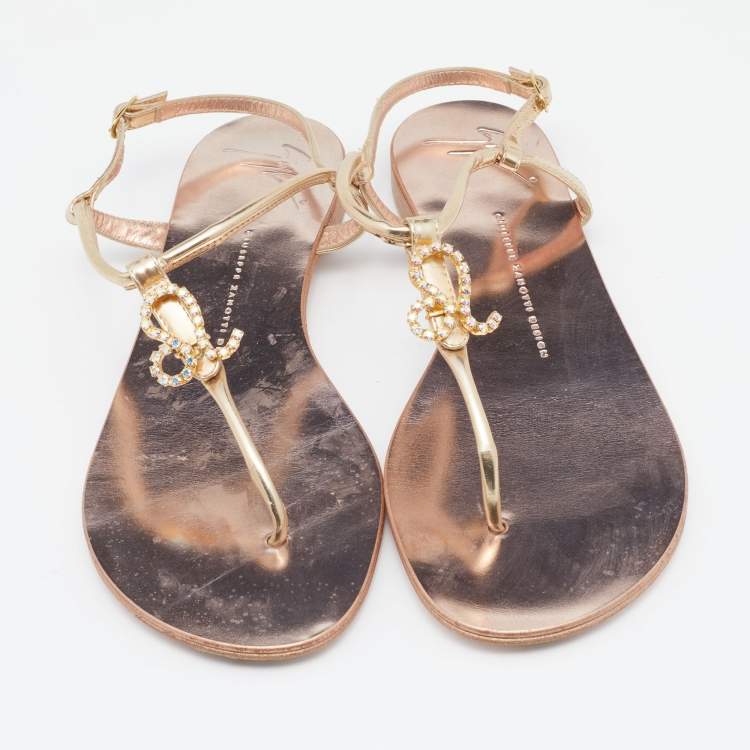 Pre Owned Giuseppe Zanotti Metallic Gold Leather Leo Zodiac Embellished Thong Flat Sandals Size 39