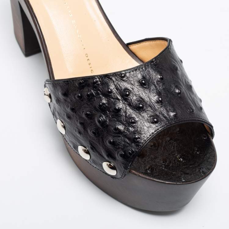 مملوكة مسبقًا Giuseppe Zanotti Black Ostrich Embossed Leather Gladis Platform Clogs Size 38.5