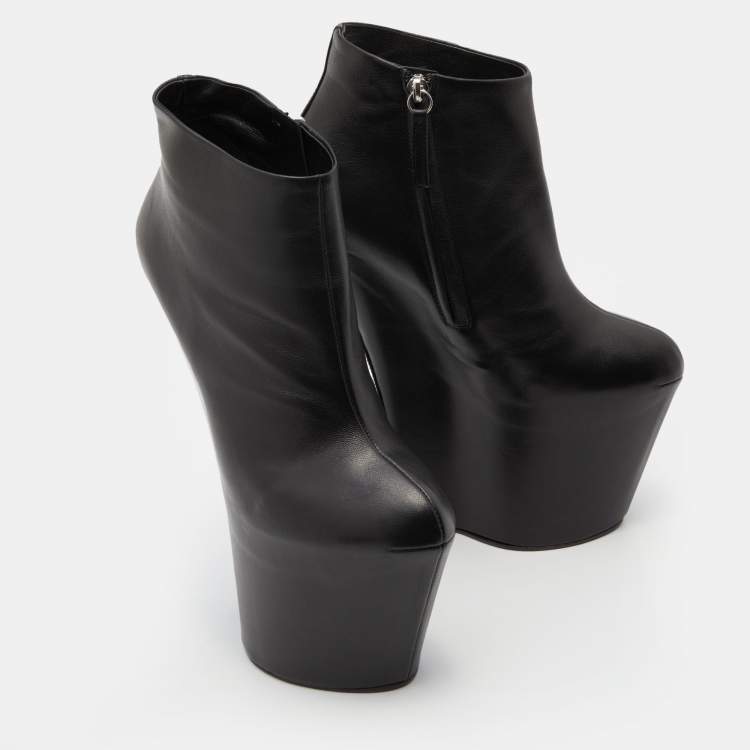 Pre Owned Giuseppe Zanotti Black Leather Heelless Platform Ankle Length Boots Size 38.5