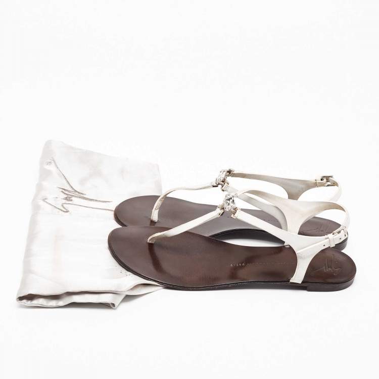 مملوكة مسبقًا Giuseppe Zanotti White Leather Crystal Embellished Thong Flat Sandals Size 40.5