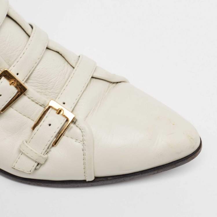 Pre Owned Giuseppe Zanotti Cream Leather Studded and Fringed Buckled Ankle Boots Size 39