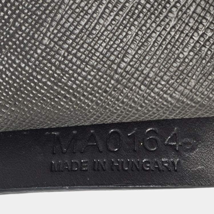 Pre Owned Givenchy Black Coated Canvas Rottweiler Face Wristlet Pouch