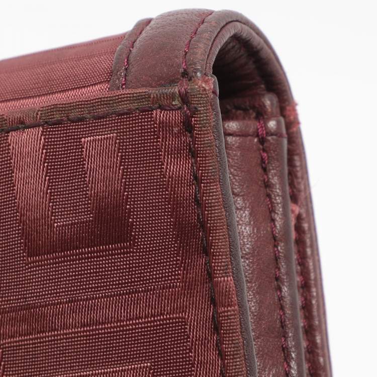 مملوكة مسبقًا محفظة كونتينينتال جيفنشي جلد ونايلون مونوغرامي بورجوندي