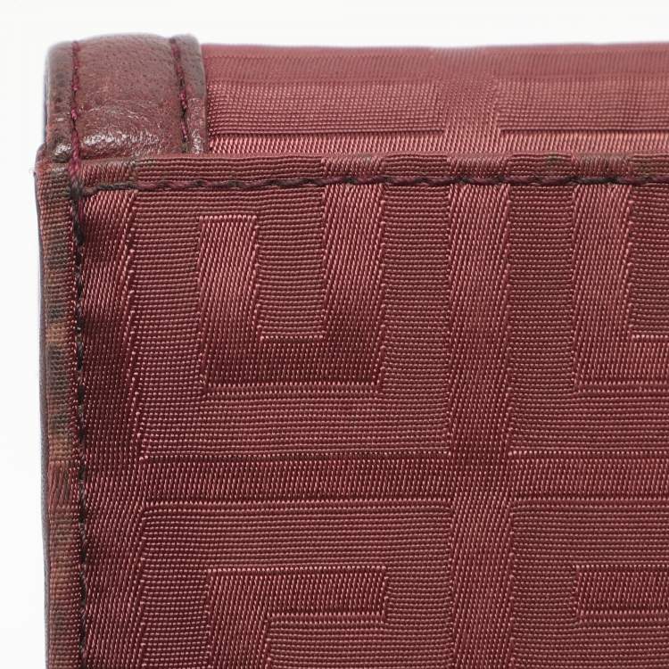 مملوكة مسبقًا محفظة كونتينينتال جيفنشي جلد ونايلون مونوغرامي بورجوندي