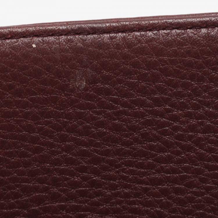 مملوكة مسبقًا محفظة كونتينينتال جيفنشي جلد ونايلون مونوغرامي بورجوندي