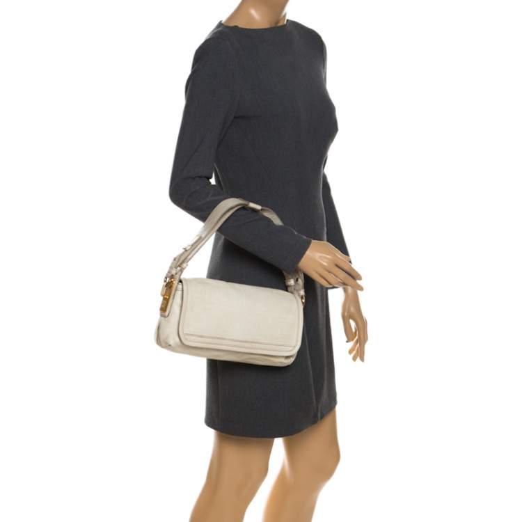 Pre Owned Givenchy Off White Logo Embossed Leather Flap Shoulder Bag