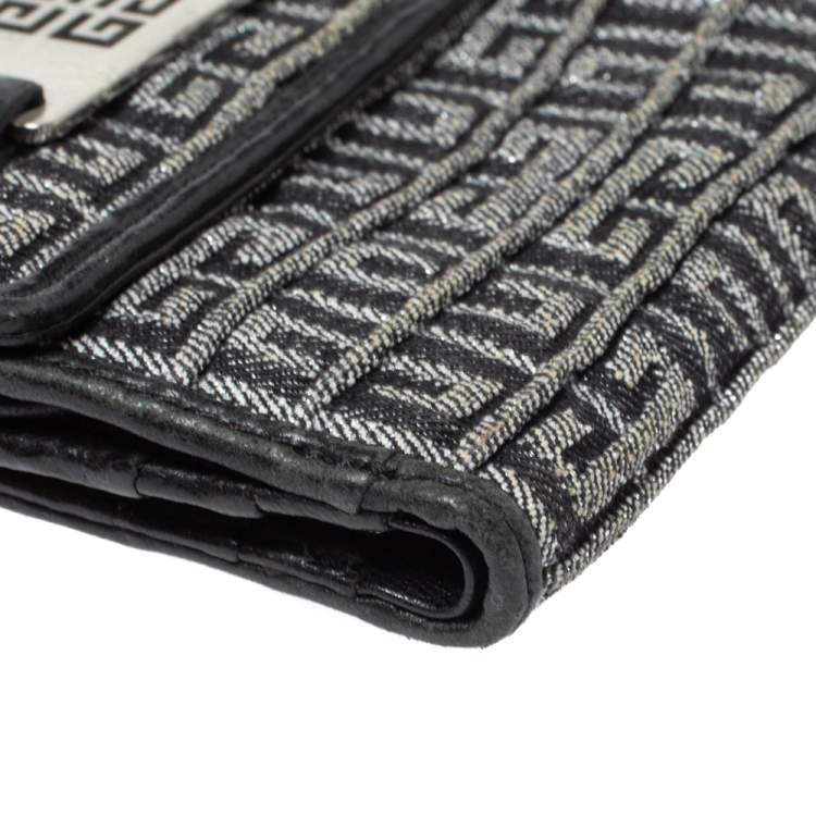 Pre Owned Givenchy Silver/Black Canvas and Leather Trim Embossed Logo Trifold Wallet