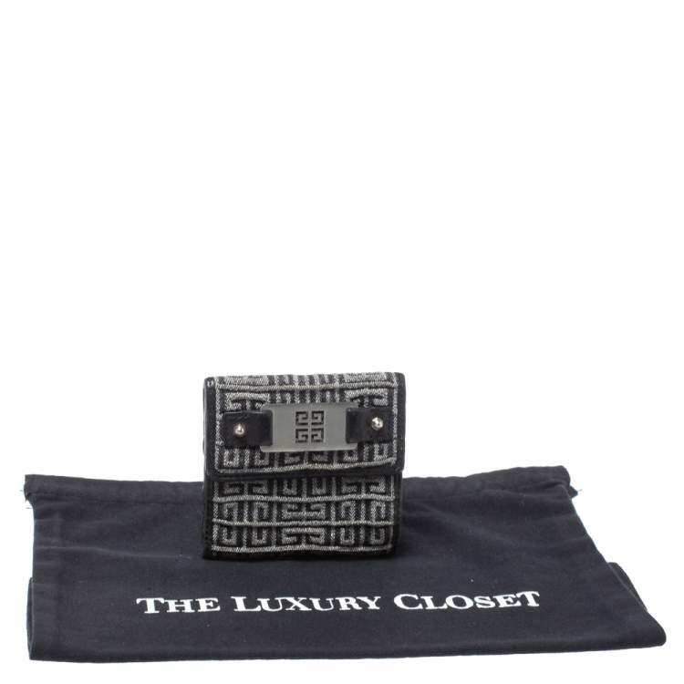 Pre Owned Givenchy Silver/Black Canvas and Leather Trim Embossed Logo Trifold Wallet