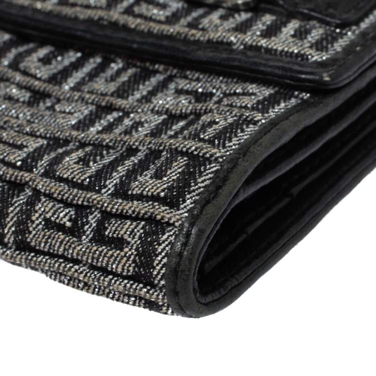 Pre Owned Givenchy Silver/Black Canvas and Leather Trim Embossed Logo Trifold Wallet