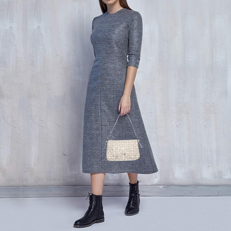 مملوكة مسبقًا Givenchy Silver/Beige Signature Canvas and Leather Small Baguette Bag
