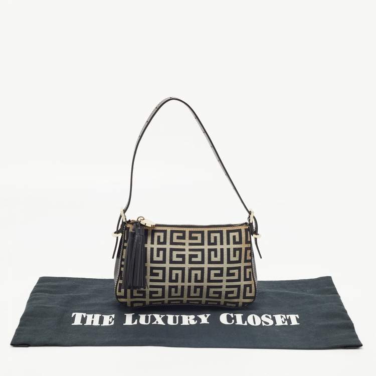 Pre Owned Givenchy Black Monogram Canvas and Leather Tassel Baguette Bag