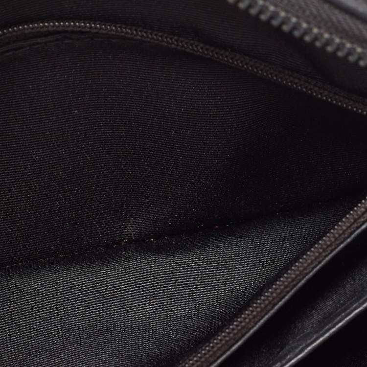Pre Owned Givenchy Black Leather Logo Embossed Wristlet Pouch