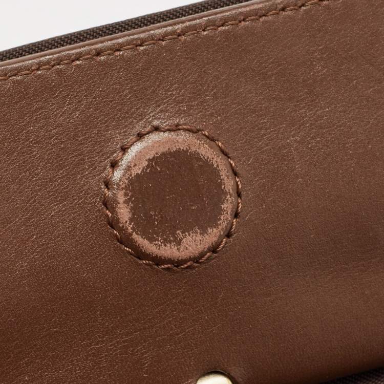 Pre Owned Givenchy Brown/Beige Monogram Canvas and Leather Buckle Flap Hobo