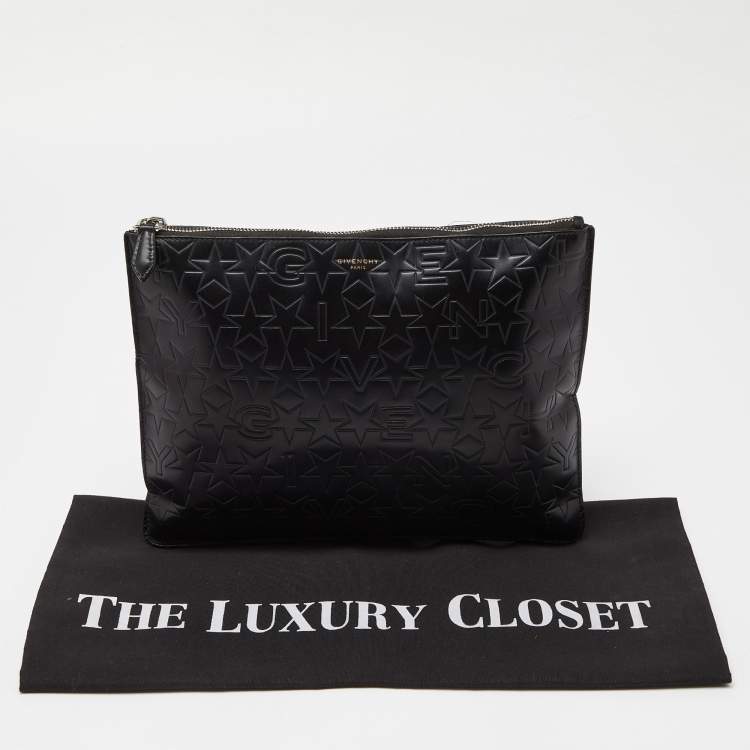 Pre Owned Givenchy Black Star Embossed Leather Zip Clutch
