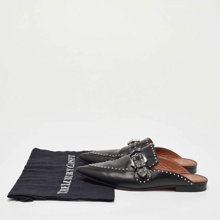 مملوكة مسبقًا Givenchy Black Studded Leather Buckle Logo Detail Flat Mules Size 38.5