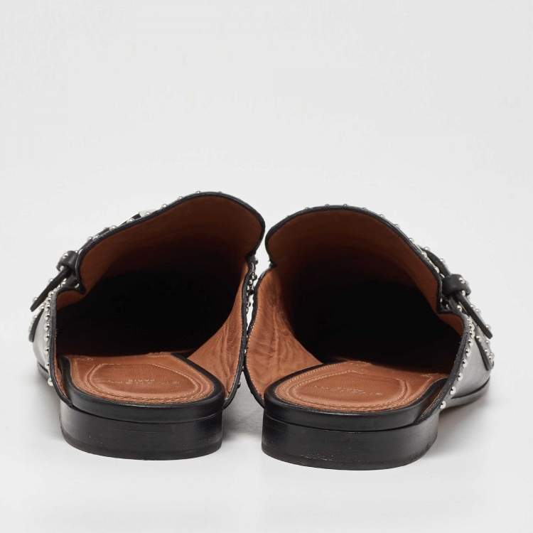 مملوكة مسبقًا Givenchy Black Studded Leather Buckle Logo Detail Flat Mules Size 38.5