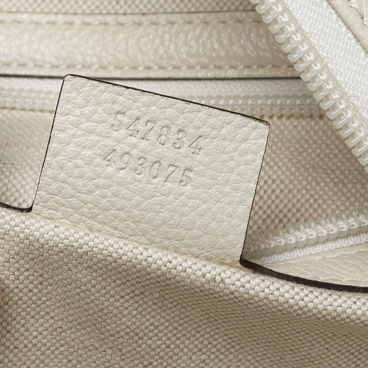 مملوكة مسبقًا Gucci Off White Leather Logo Print Backpack