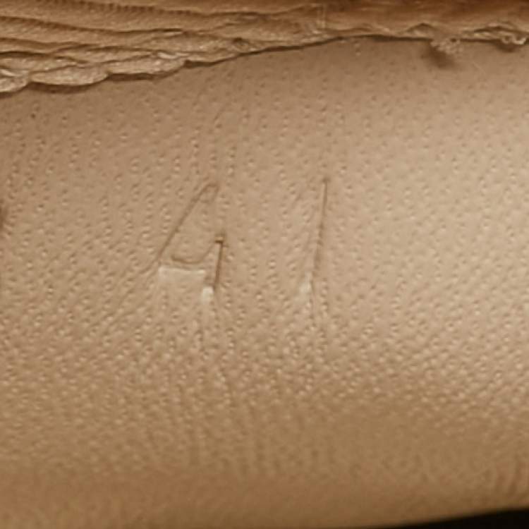 Pre Owned Gucci Cream Leather Vintage Logo Rhyton Sneakers Size 41