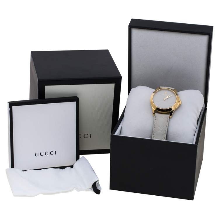 Pre Owned Gucci White Yellow Gold PVD Coated Stainless Steel Leather G-Timeless 126.4 Women's Wristwatch 38 mm