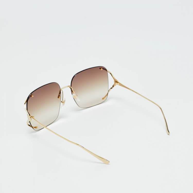 Pre Owned Gucci Beige/Gold Tone Gradient GG0646S Rimless Oversized Sunglasses