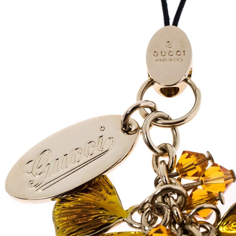 Pre Owned Gucci Logo Enamel Crystal Gold Tone Cell Phone Charm