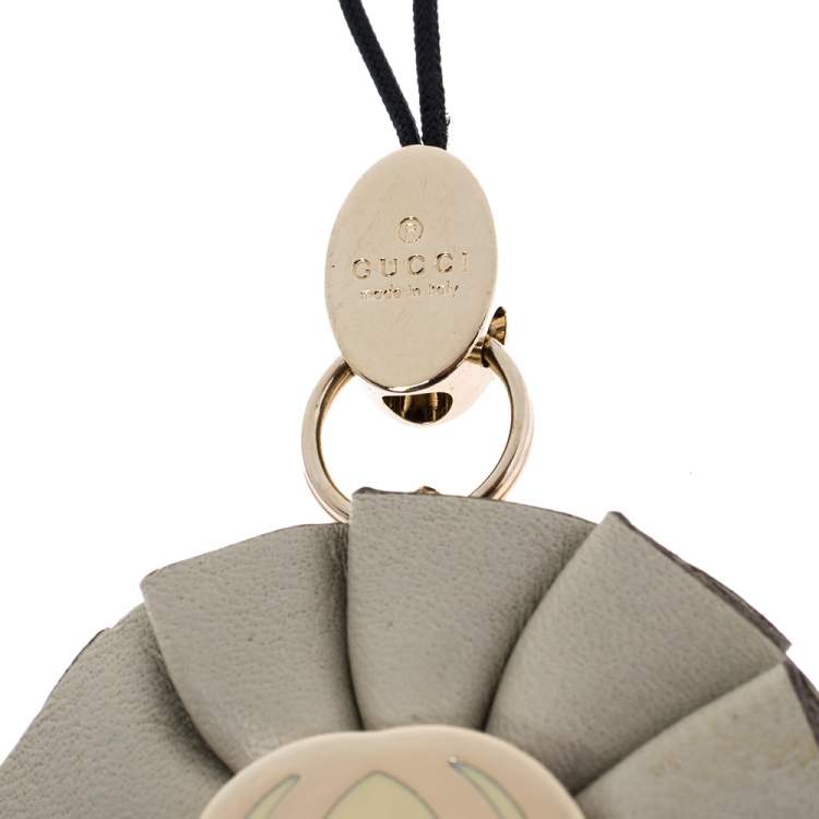 Pre Owned Gucci GG Enamel Leather Gold Tone Floral Cell Phone Charm 