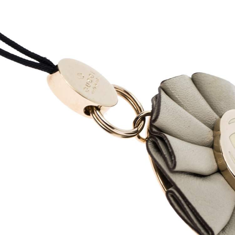 Pre Owned Gucci GG Enamel Leather Gold Tone Floral Cell Phone Charm 
