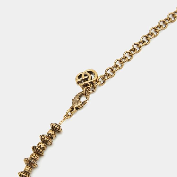 Pre Owned Gucci Aged Scarab and Cross Charms Gold Tone Necklace