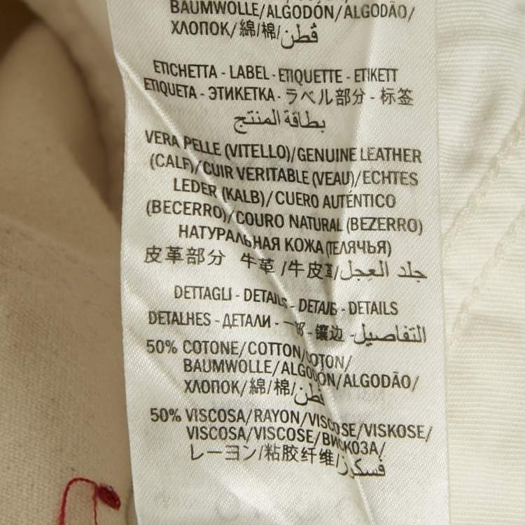 مملوكة مسبقًا بنطلون جينز غوتشي دنيم بيج مزين بشريط وِب تأثير تنويم مغناطيسي صغير مقاس خصر 28 بوصة